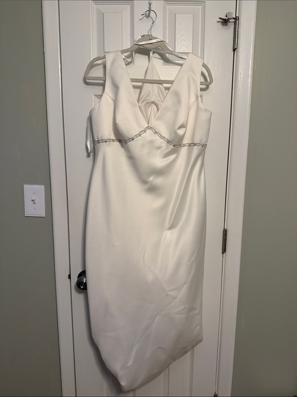 Classic Ivory Sleeveless Wedding Dress with Beaded Waist